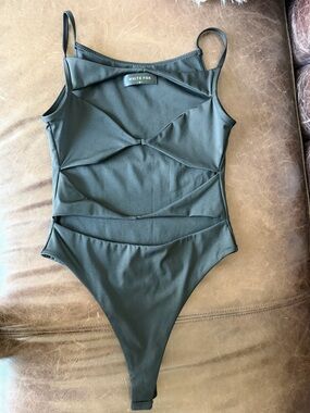 White Fox Women’s Black One-Piece Bodysuit with Cutout Detail